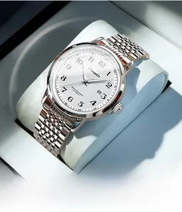 Detail of Comuder mechanical watch with white textured dial and silver steel band