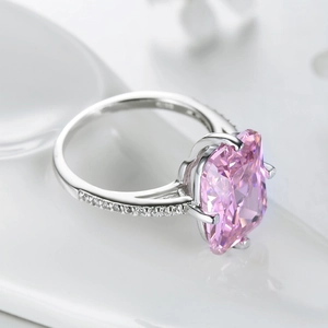 Luxurious S925 silver ring with cushion-cut pink gemstone and micro-pave diamonds