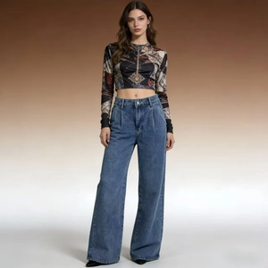 Detail of vintage blue high waist wide-leg denim jeans with retro street style aesthetic