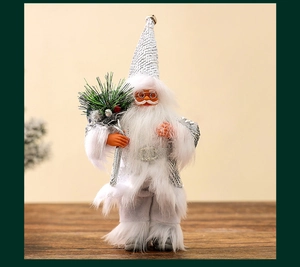 Detail of silver Christmas Santa figurine with sequined hat and frosted pine bag