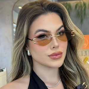 Frameless diamond-shaped sunglasses with gradient tea lenses and gold claw metal trim