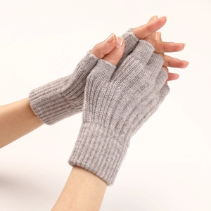 Detailed view of grey cable knit fingerless gloves with ribbed cuffs for winter warmth
