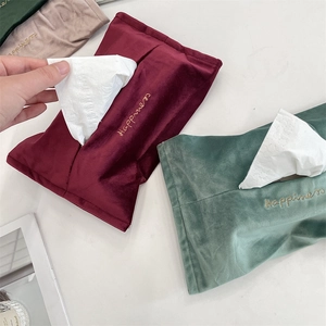 Luxurious velvet tissue pouch with Happiness gold embroidery in red and green colors