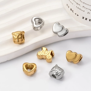 DIY stainless steel charms in owl, heart, and butterfly shapes for jewelry making