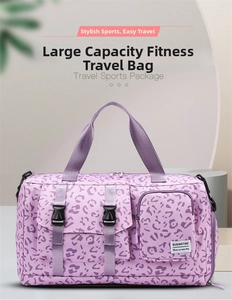 Detailed view of purple leopard print travel bag with multiple pockets and sturdy handles