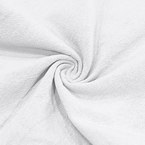 Gros plan sur la texture du tissu en lin blanc de qualité pour ensemble de plage homme