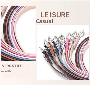 Detailed view of colorful slim faux leather belts with polished silver alloy buckles