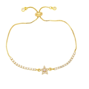 Adjustable gold star bracelet with pave zircons and purple center stone on white backdrop