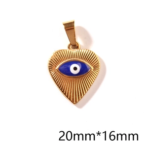 Macro detail of golden heart pendant with evil eye motif and 20mm x 16mm dimensions