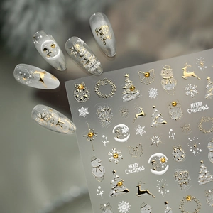 Goldene 5D Weihnachts-Nagelaufkleber mit Rentier-, Schneemann- und Schneeflocken-Reliefs