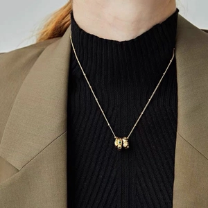Retro stainless steel gold chain necklace with emerald green zircon pendant for women