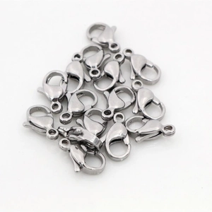 Macro shot of silver stainless steel lobster clasps for jewelry making and necklace links