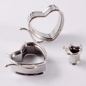 Polished stainless steel heart devil horn flesh tunnels in three different sizes