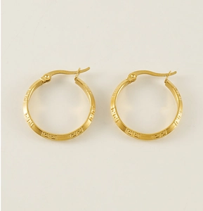 Detailed close-up of 18K gold-plated stainless steel hoop earrings with Greek key pattern