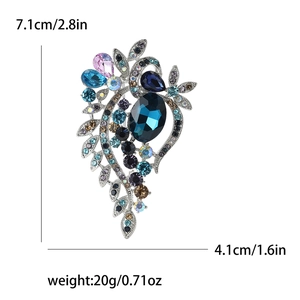 Detailed dimensions of a crystal floral brooch with 7.1cm height and 4.1cm width