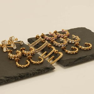 Luxury 18K gold-plated stainless steel earrings set with geometric crystal designs