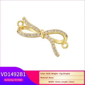 Detailed specs of gold brass ribbon pendant with white zircon in 12mm x 23mm size