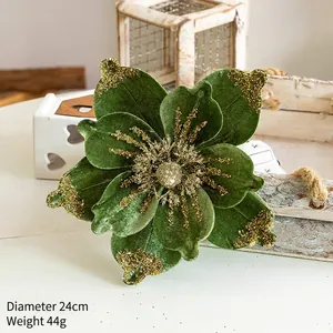 Detail of 24cm dark green velvet Christmas flower with golden glitter sequins finish