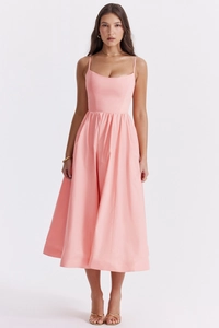 Detail view of the pink summer dress with spaghetti straps and an A-line waist design