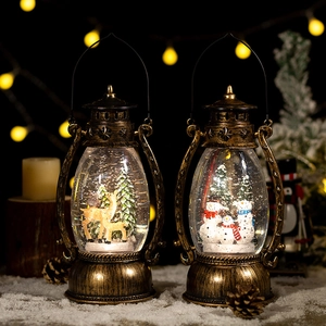Vintage bronze Christmas lantern snow globe with Santa and Reindeer scene and LED light