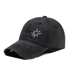 Black cotton baseball cap featuring white sun embroidery and classic curved brim style