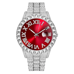 Detail of silver iced-out watch with red dial, Roman numerals and date display