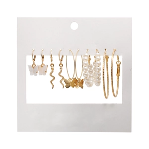 6-pair gold earring set with butterfly, snake pendants and pearls on display card