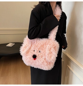 Detailed view of pink furry dog-themed shoulder bag featuring plush animal face design