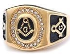 Detailed macro view of a gold Masonic ring featuring square and compass symbols with rhinestones