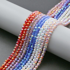 Macro detail of 4mm faceted glass beads with AB iridescent finish for jewelry making