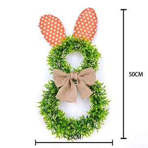 50cm Easter bunny wreath featuring green leaves, polka dot ears, and a burlap bow