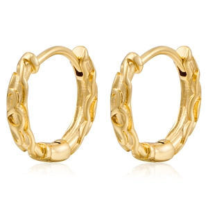 Detailed view of gold-plated hoop earrings with continuous embossed wave patterns