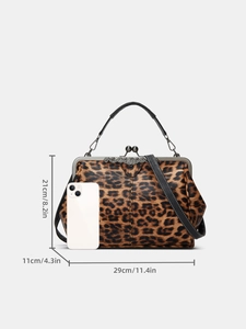 Leopard print handbag dimensions 29x21x11cm shown with smartphone for size reference