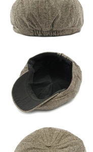 Dettagli della coppola marrone a spina di pesce con texture in tweed e fascia elastica
