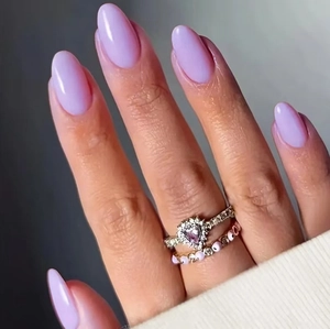 Elegant purple heart gemstone ring set with silver bands and lavender zircon accents