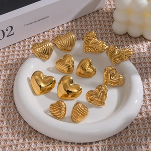 Elegant gold heart stud earrings with assorted textures and polished finishes for women