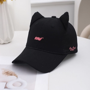 Black cotton cat ear baseball cap with pink embroidery on a minimalist white background