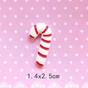 Detailed view of red and white striped Christmas candy cane resin DIY craft accessory