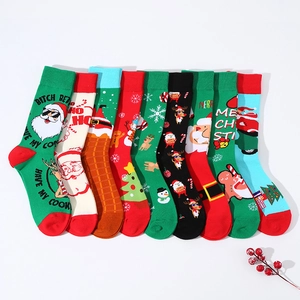 Christmas cotton mid-calf socks collection with festive Santa and snowman patterns on white