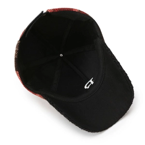 Fashionable red and black plaid baseball cap with internal view of six-panel construction