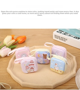 Detailed close-up of cute cartoon square tinplate coin purses with convenient zipper closures