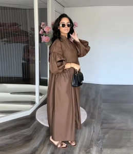 Brown long maxi dress with pleated crewneck detail and elegant lantern sleeves