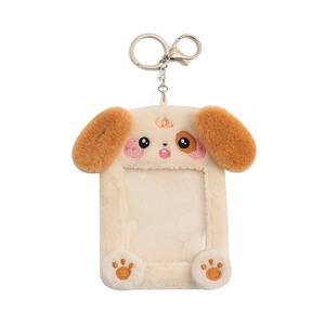 Cute plush dog photocard holder keychain in cream white with brown ears on white background