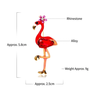 Detail of pink flamingo brooch showing dimensions of 5.8cm height and crystal accents
