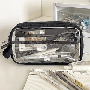 Detail of black high-capacity pencil case with transparent window and side handle strap