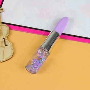Lipstick-shaped gel pen with purple glitter liquid and star sequins on colorful background