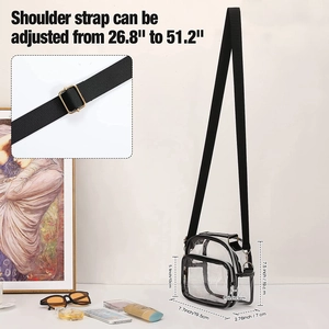 Detail of clear PVC crossbody bag with adjustable strap and silver metal buckle
