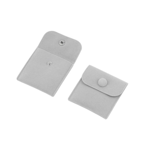Light gray velvet jewelry envelope pouches with snap buttons in open and closed views