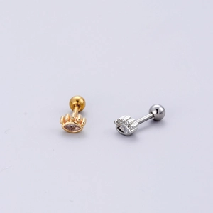 Detail of snake eye earring in gold and silver finish with clear zircon screw back stud