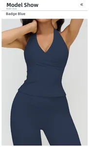 Front model view of insignia blue V-neck halter yoga top and high waist leggings set